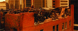 A building top is damaged by fire